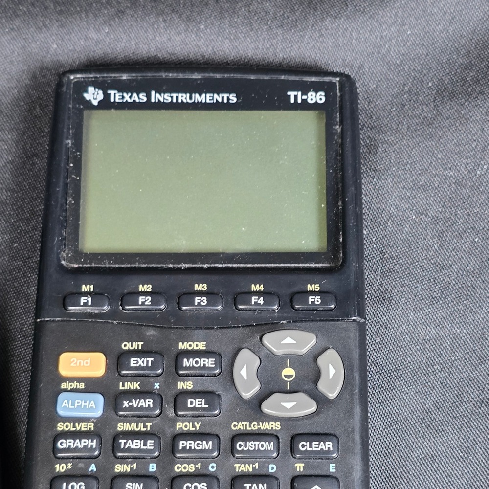 Texas Instruments TI-86 graphing calculator with cover‎